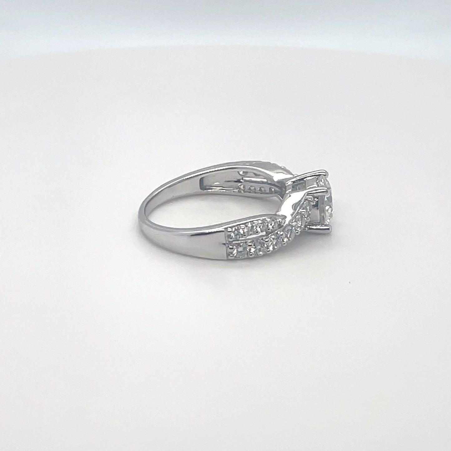 TTT Rhodium Plated, Sterling Silver Twisted Ring w/1 Ct Round & Moissanite Gemstone Accents.-WH