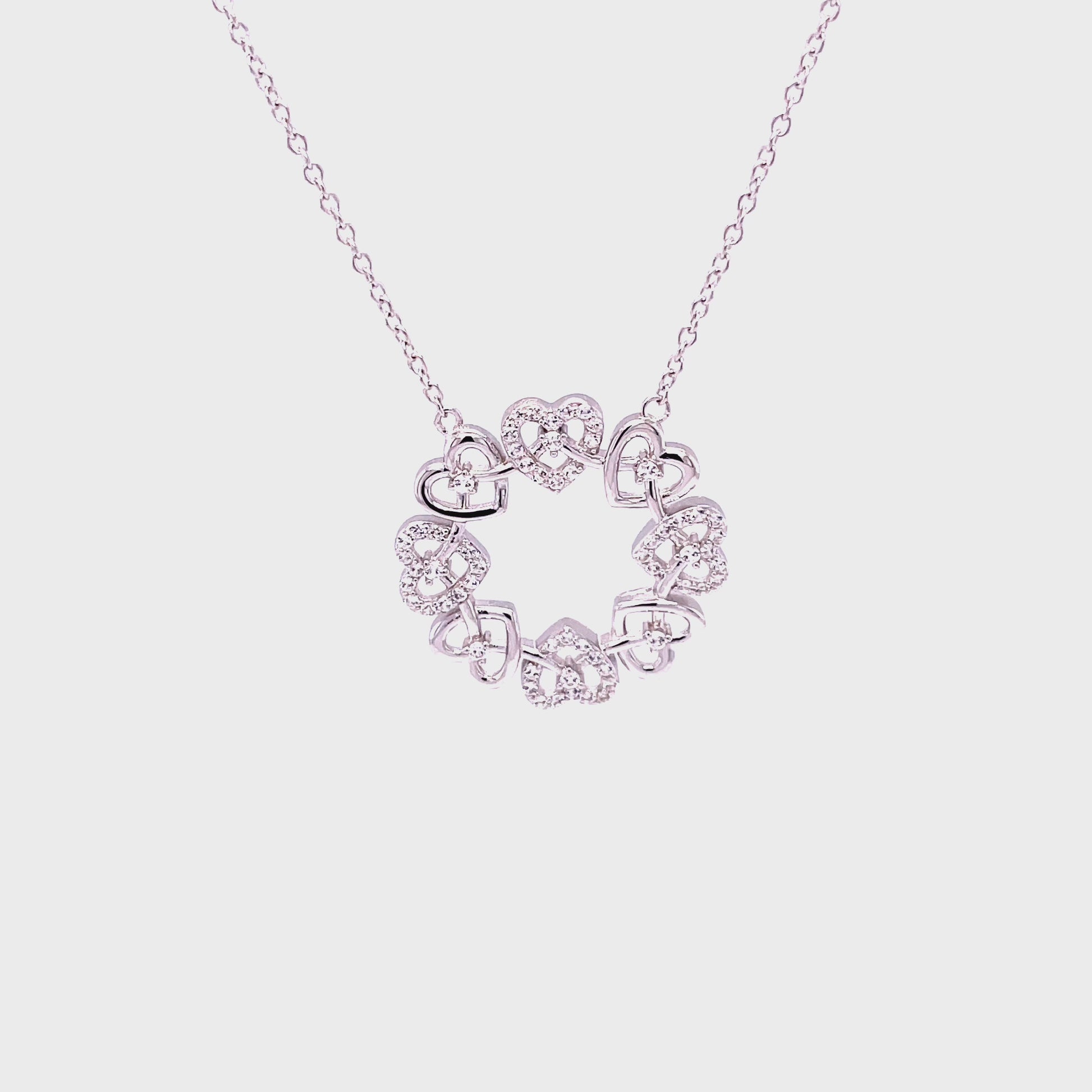 M Many Hearts, One Family Circle of Hearts Pendant; SS w/Created Sapphire Highlights &  18" Chain.