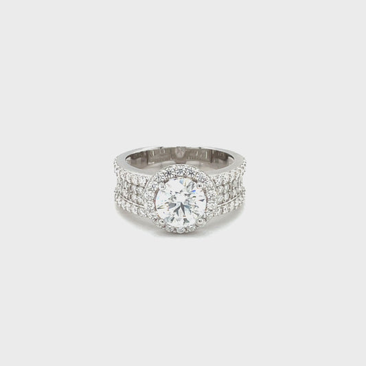 Through Thick & Thin Platinum Plated, Sterling Silver Ring w/1.5 Ct Round Center & Side Accent Moissanite Gemstones.