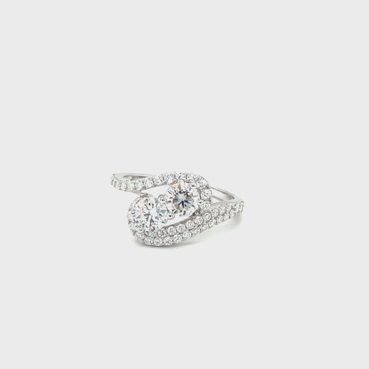 Through Thick & Thin Platinum Plated, Sterling Silver Ring w/2 Round and Moissanite Gemstone Accents on a Slanted, Swirl Band.