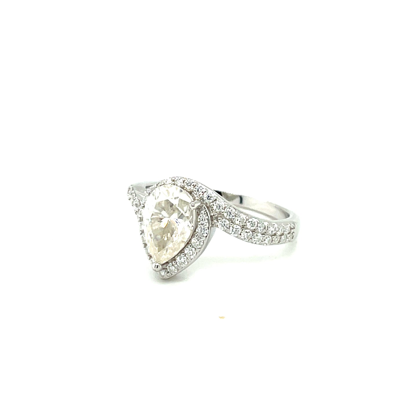 Through Thick & Thin Platinum Plated, Sterling Silver Ring w/2 Ct Pear Shaped Center & Full Moissanite Gemstones Highlights.